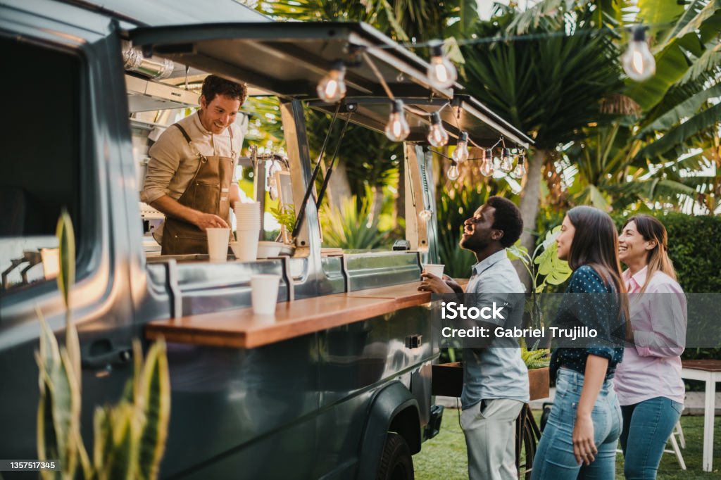 people ordering at a food truck